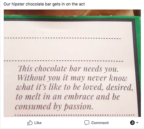 Text on wrapper. This chocolate bar need you. Without you it may never know what it's like to be loved, desired, to melt in an embrace and be consumed by passion.